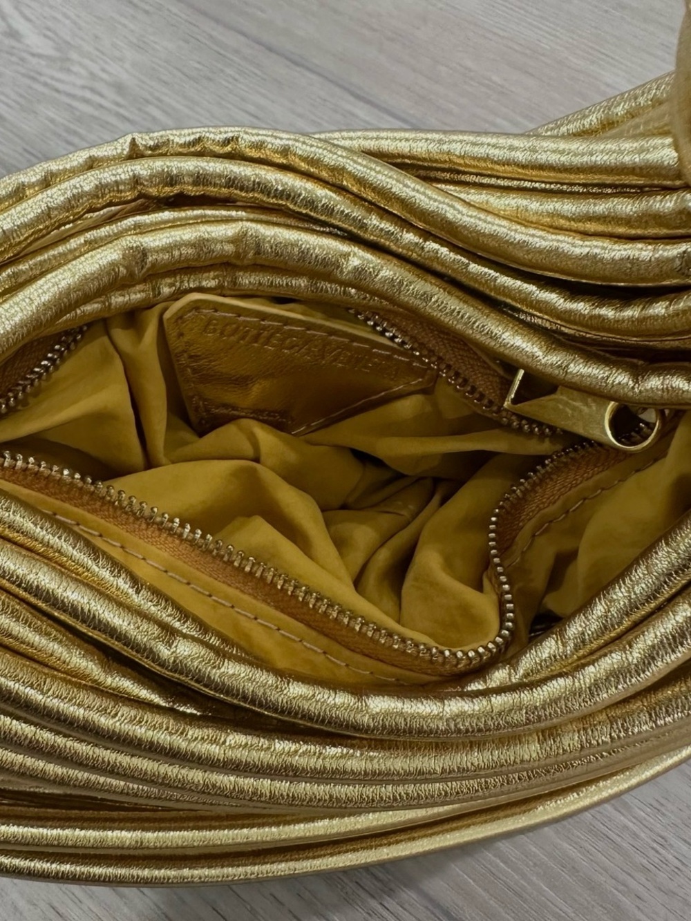 NWOT BOTTEGA VENETA leather double knot tubular mini spaghetti bag clutch gold - Picture 7 of 9